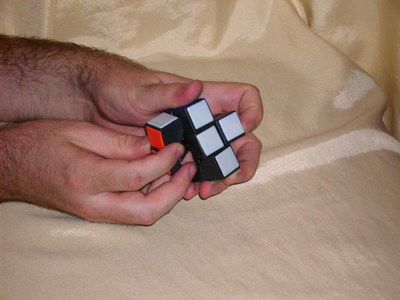 Arrange four edge pieces around one centre piece