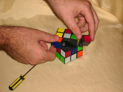 Remove the two corner pieces next to the missing edge piece